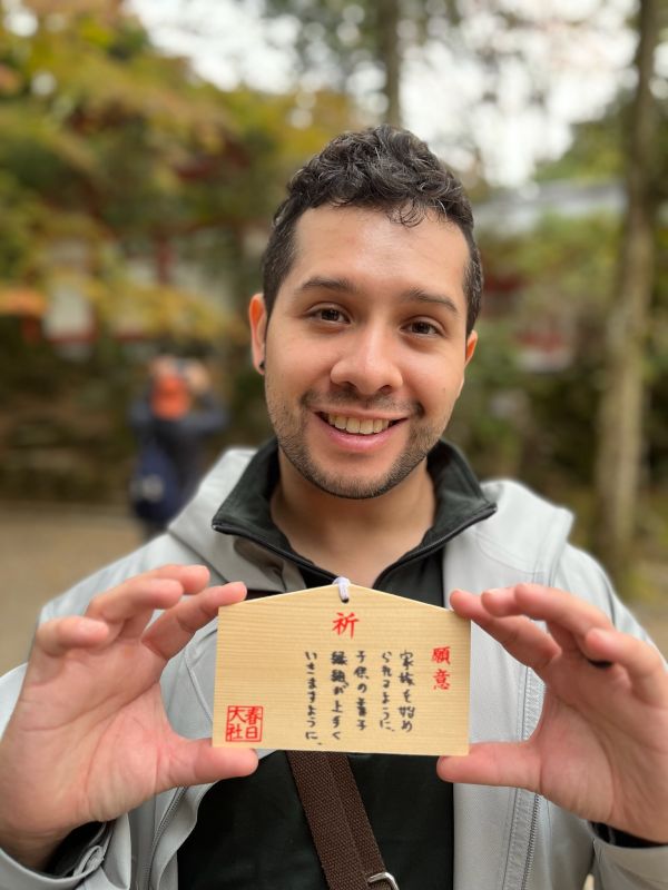 Lu Sharing His Adoption Wish at a Shrine in Japan