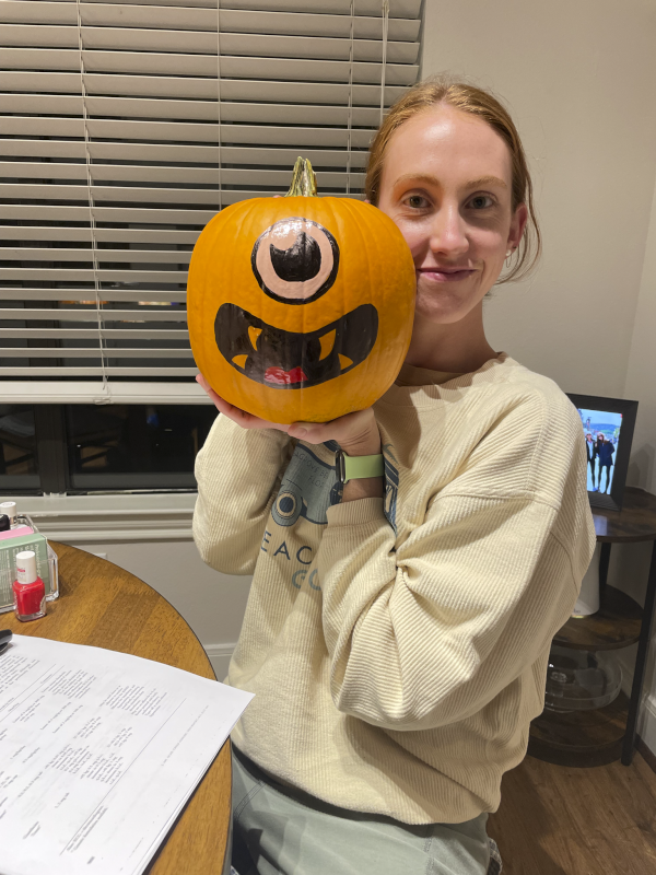 Maddie Painting Pumpkins for Halloween